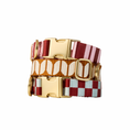 Load image into Gallery viewer, The Hersh Bed Striped, Checkered and Animal designer dog collars with gold hardware on a white background
